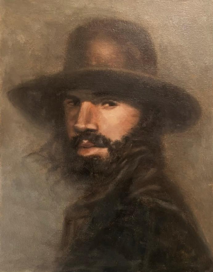 Brown toned portrait of a cowboy